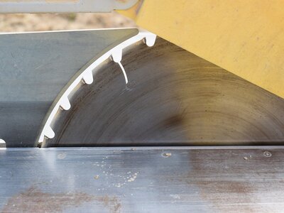 Raise the table saw blade to cut properly