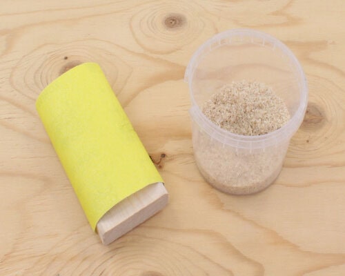 Collect sanding dust or sawdust