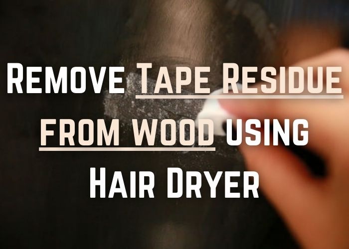 Adhesive residues removed from wood using a hair dryer