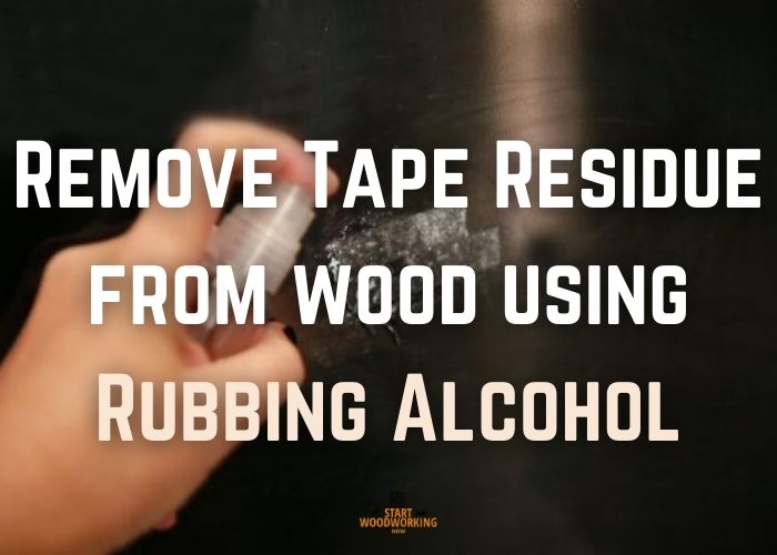 Remove adhesive residue from wood using rubbing alcohol