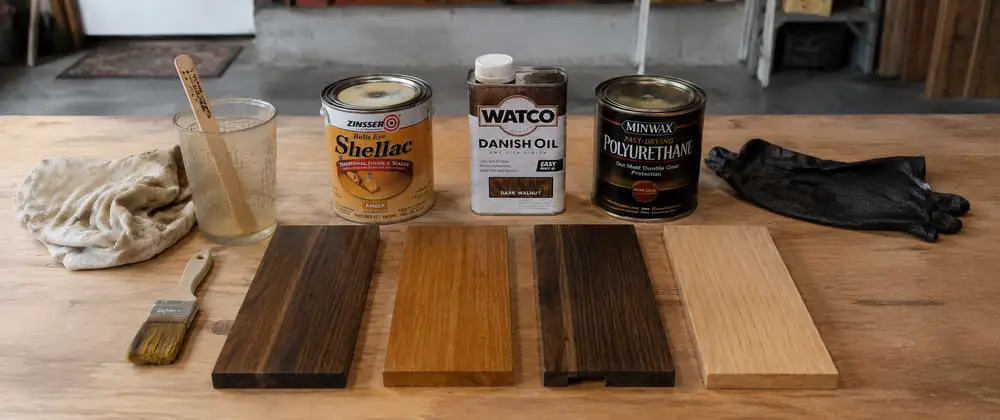 Wood finishing workshop with finish samples and application tools